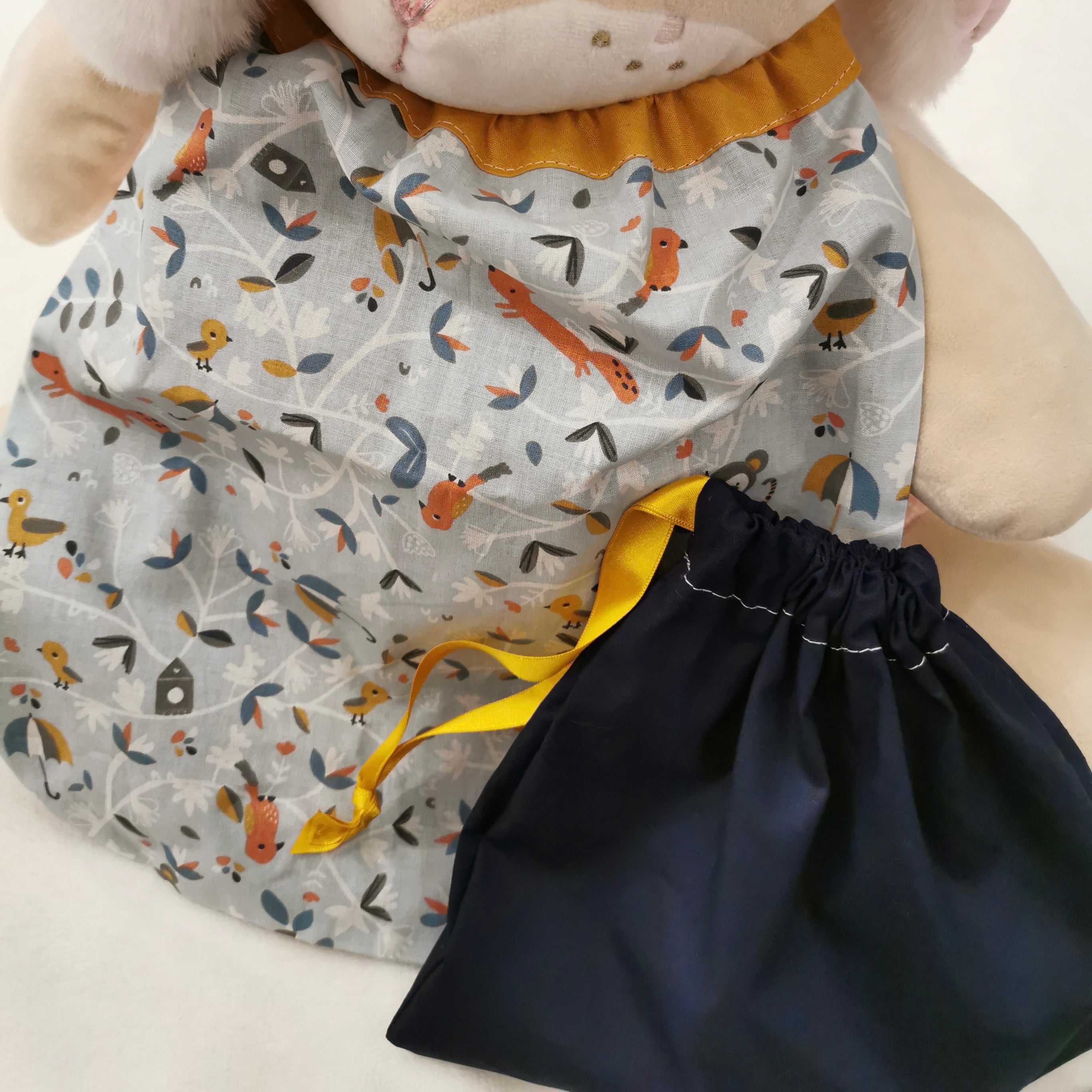 Bavoir élastique pour bébé motif oiseau avec pochon assorti fait main en France Vic et Pic