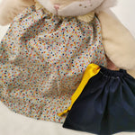 Bavoir élastique pour bébé motif cotillons avec le pochon assorti  fait main en france par Vic & Pic