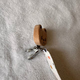 Attache tétine